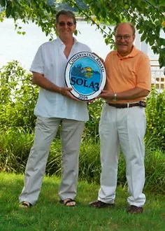 In this photo are the winners of the first SOLA3 Conservation Award given in 2009 - Tom Childers (left) and John Hall, who established a native plant riparian border along their lakefront property. 
